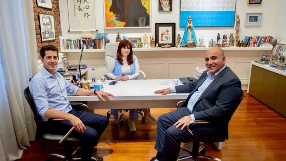 Cristina con Wado y Juan Manzur