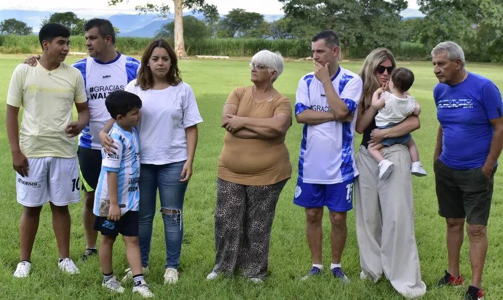 Busse con sus padres esposa y familia