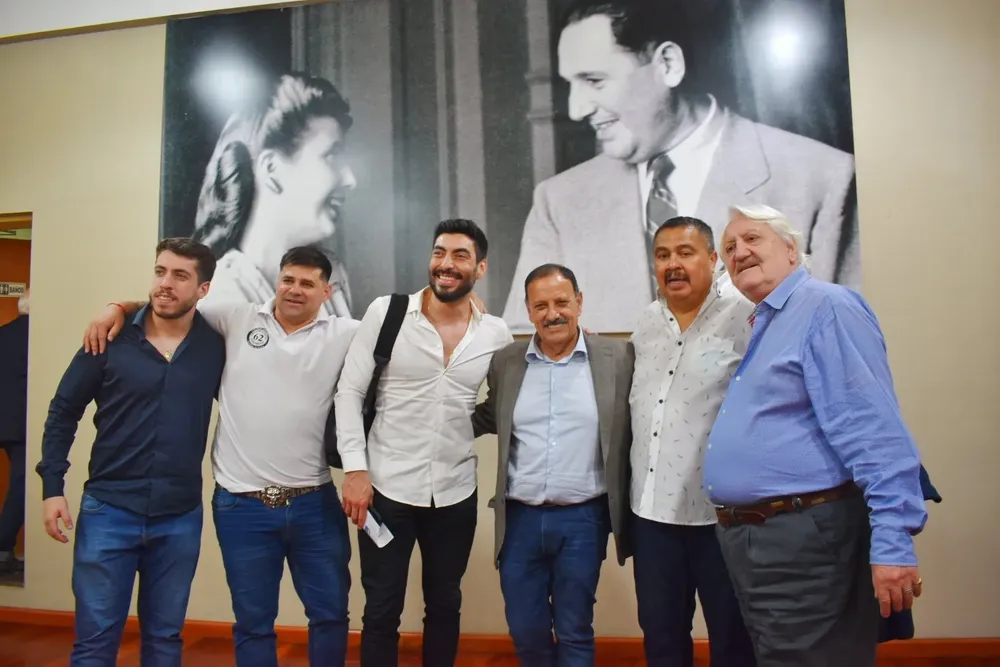 Quintela con un Moyano y el negro Ibarra